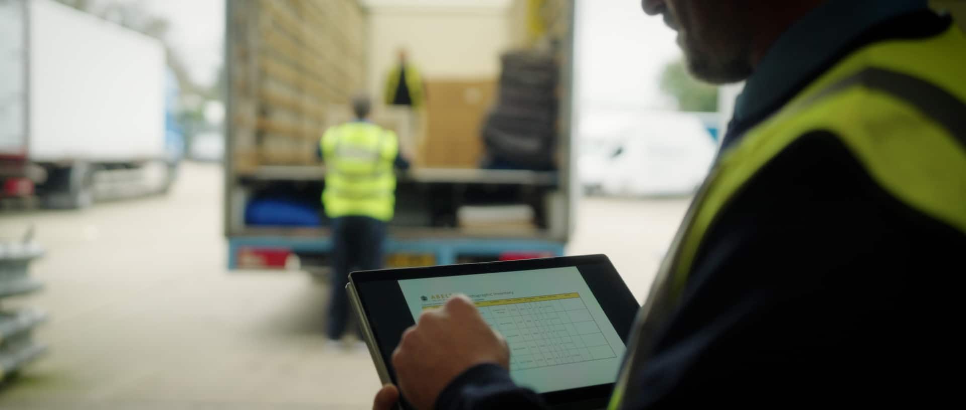 Man inventorying delivery